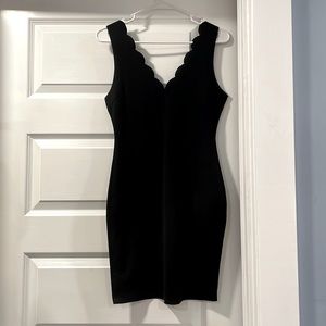 Tight black dress, size4, length above knees. Party, cocktail or casual dress